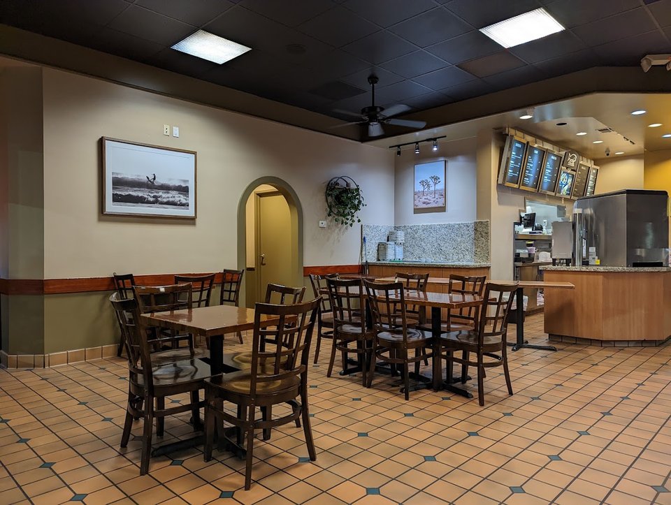 Bright dining room with seating and tables